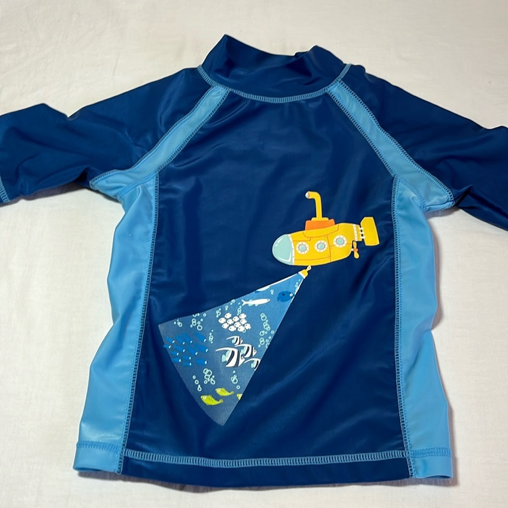 UV Skins size 7 rash guard